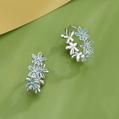 Boucles d'oreilles créoles en guirlande vert menthe et émaillées